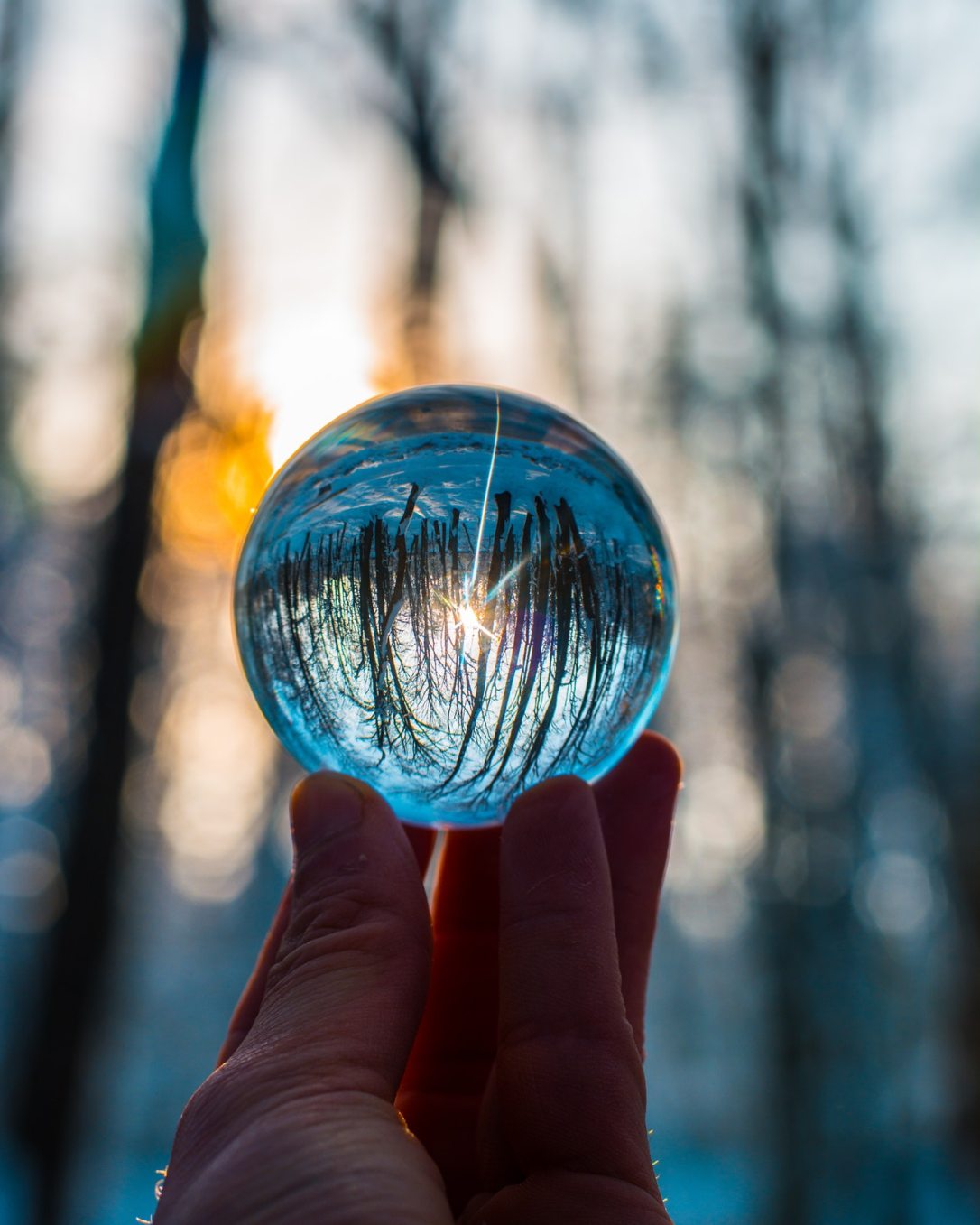 photo-of-person-holding-crystal-ball-1645668